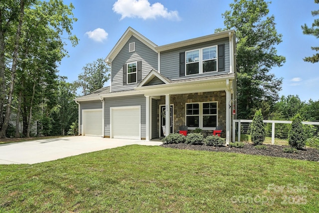 280 Mills Creek Rd, Iron Station, NC 28080 - traditional home featuring driveway, a front yard, an attached garage, covered porch, and stone siding