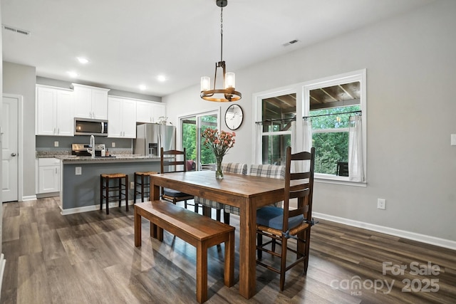 280 Mills Creek Rd, Iron Station, NC 28080 - dining area featuring dark wood-style flooring and recessed lighting