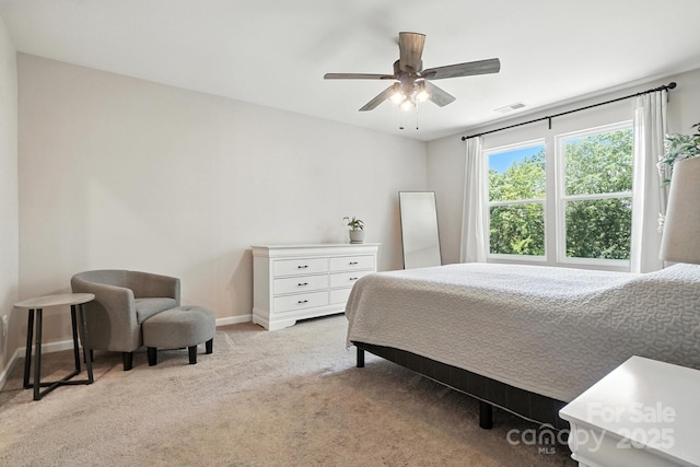 280 Mills Creek Rd, Iron Station, NC 28080 - carpeted bedroom featuring baseboards and ceiling fan