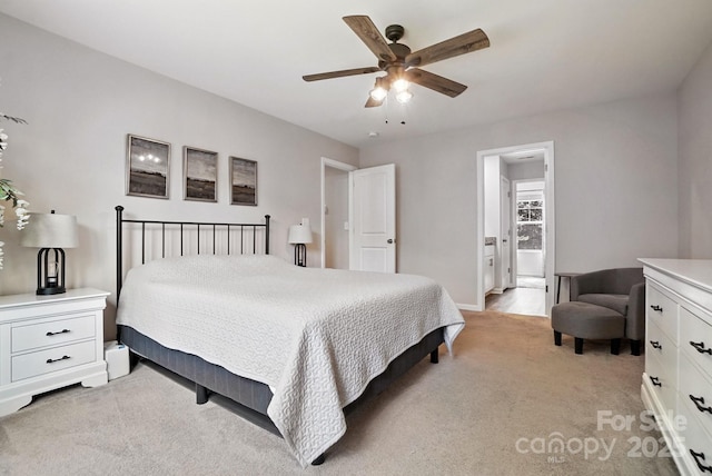 280 Mills Creek Rd, Iron Station, NC 28080 - bedroom with light colored carpet, connected bathroom, and a ceiling fan