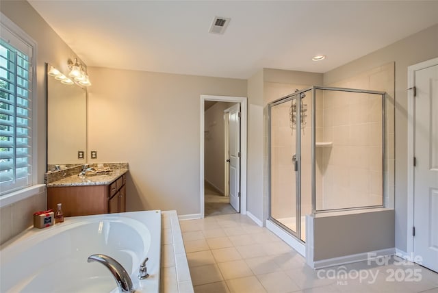 2599 Treeline Dr, Concord, NC 28027 - full bath featuring a bath, a shower stall, vanity, and tile patterned flooring