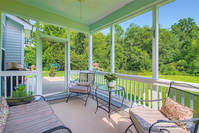 2599 Treeline Dr, Concord, NC 28027 - sunroom / solarium with a ceiling fan and view of scattered trees