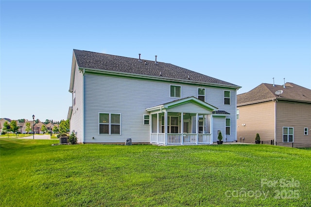 2599 Treeline Dr, Concord, NC 28027 - back of property featuring a sunroom and a lawn