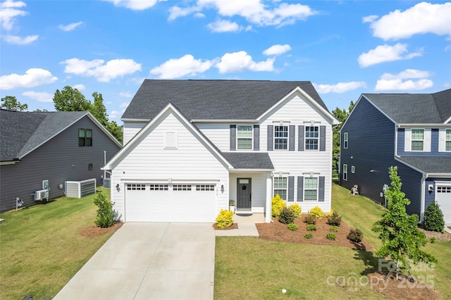 1013 Augustus Beamon Dr, Indian Trail, NC 28079 - traditional-style home featuring concrete driveway, a garage, a front lawn, and roof with shingles