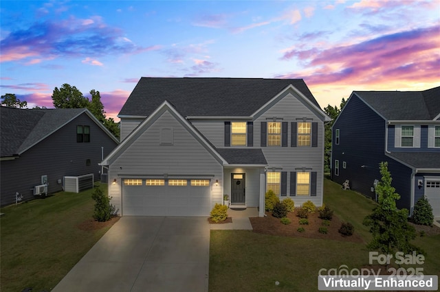1013 Augustus Beamon Dr, Indian Trail, NC 28079 - traditional-style home featuring concrete driveway, a lawn, and a shingled roof