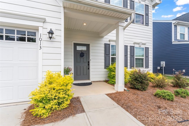1013 Augustus Beamon Dr, Indian Trail, NC 28079 - doorway to property with a garage and a porch