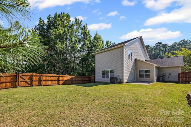 9706 Thyme Ct, Charlotte, NC 28214 - back of property featuring a fenced backyard and a patio area
