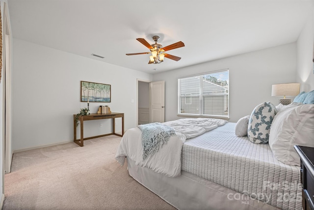 9706 Thyme Ct, Charlotte, NC 28214 - bedroom with light colored carpet and a ceiling fan