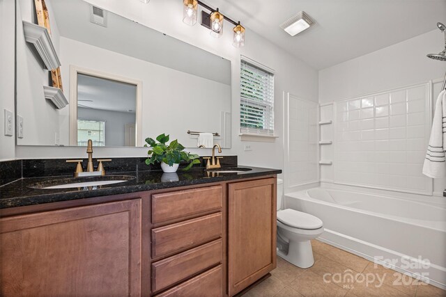 9706 Thyme Ct, Charlotte, NC 28214 - bathroom featuring double vanity, tile patterned floors, healthy amount of natural light, and shower / bath combination