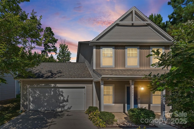 9706 Thyme Ct, Charlotte, NC 28214 - view of front of home featuring a porch, an attached garage, and driveway