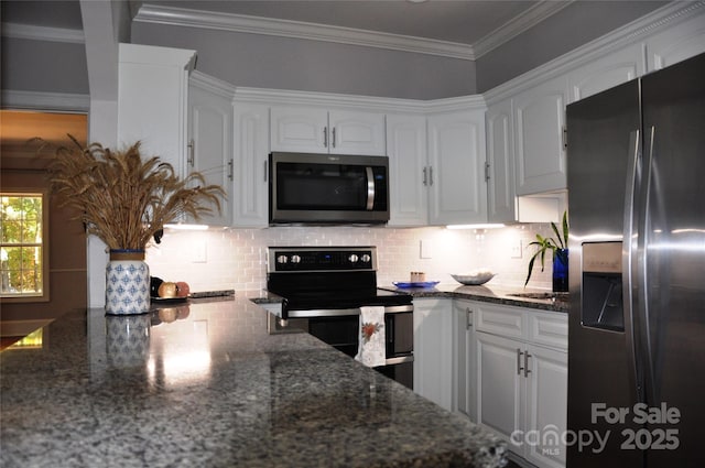 3645 Lake Bluff Dr, Sherrills Ford, NC 28763 - kitchen featuring appliances with stainless steel finishes, white cabinetry, dark stone counters, decorative backsplash, and ornamental molding