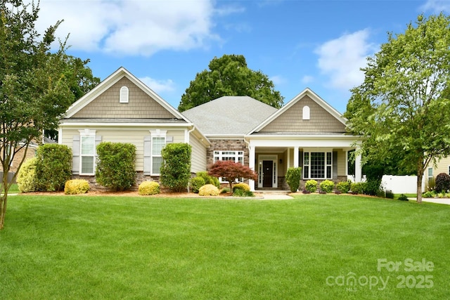 551 Brightleaf Pl NW, Concord, NC 28027 - craftsman-style house featuring a front yard and stone siding