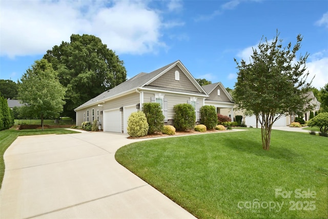 551 Brightleaf Pl NW, Concord, NC 28027 - view of front of home with concrete driveway, a front lawn, and a garage