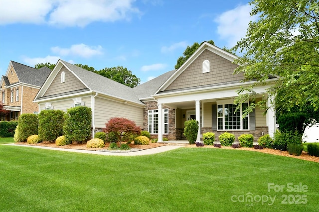 551 Brightleaf Pl NW, Concord, NC 28027 - craftsman inspired home with a front lawn, stone siding, and a porch