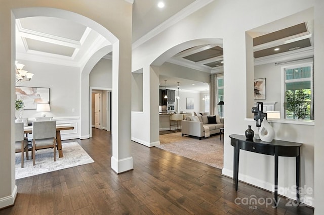551 Brightleaf Pl NW, Concord, NC 28027 - foyer entrance with ornamental molding, coffered ceiling, arched walkways, plenty of natural light, and dark wood finished floors