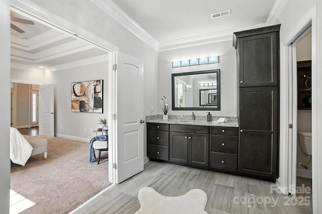 551 Brightleaf Pl NW, Concord, NC 28027 - full bath featuring vanity, wood finished floors, and ornamental molding