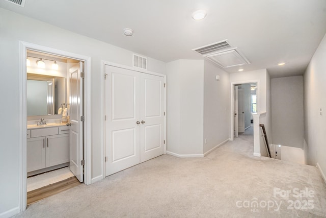 508 Morrows Turnout Way Unit 97, Pineville, NC 28134 - unfurnished bedroom with attic access, light carpet, recessed lighting, connected bathroom, and a closet
