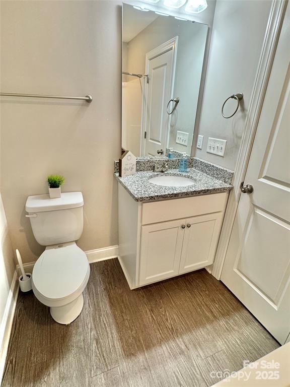 212 Old Centergrove Rd, Kannapolis, NC 28083 - full bath with vanity and wood finished floors
