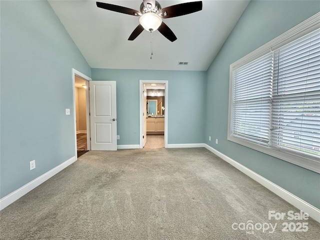 212 Old Centergrove Rd, Kannapolis, NC 28083 - unfurnished bedroom with lofted ceiling, carpet floors, ensuite bathroom, and ceiling fan