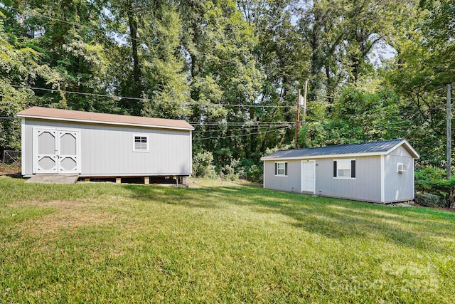 2830 Royston Rd Unit 2, Charlotte, NC 28208 - view of grassy yard with view of scattered trees and a storage shed