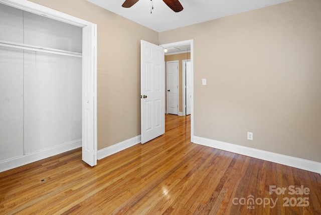 2830 Royston Rd Unit 2, Charlotte, NC 28208 - unfurnished bedroom with light wood finished floors, a closet, and ceiling fan
