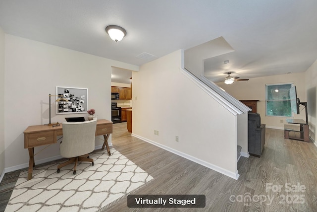 374 Morning Dew Dr, Concord, NC 28025 - office area with light wood-style floors and ceiling fan