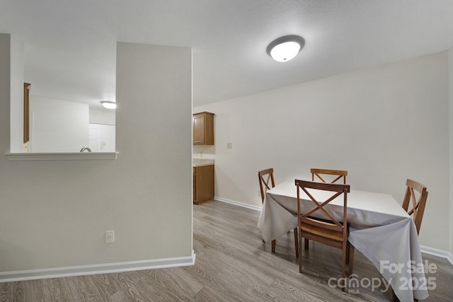 374 Morning Dew Dr, Concord, NC 28025 - dining room featuring baseboards and wood finished floors