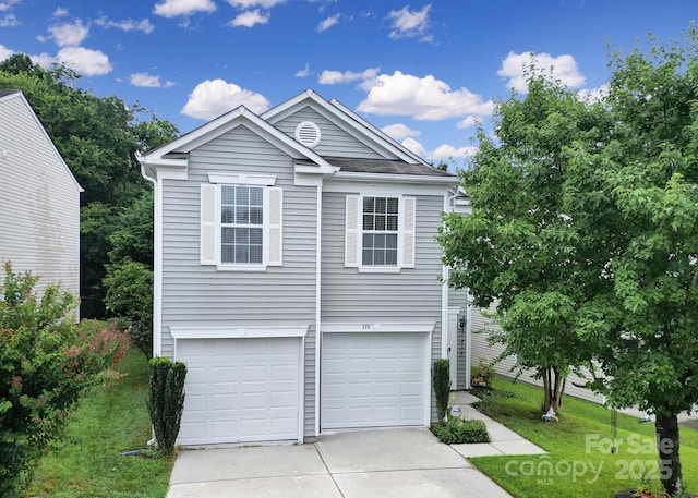 374 Morning Dew Dr, Concord, NC 28025 - view of front facade featuring driveway, a garage, and a front lawn