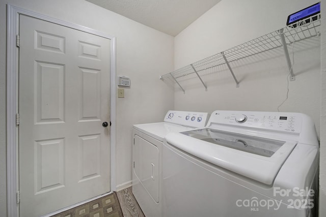 374 Morning Dew Dr, Concord, NC 28025 - laundry area featuring washer and clothes dryer and baseboards