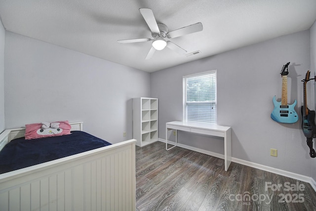 374 Morning Dew Dr, Concord, NC 28025 - bedroom featuring wood finished floors, ceiling fan, and a textured ceiling