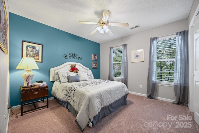 7029 Scuppernong Ct, Charlotte, NC 28215 - carpeted bedroom featuring a textured ceiling and a ceiling fan
