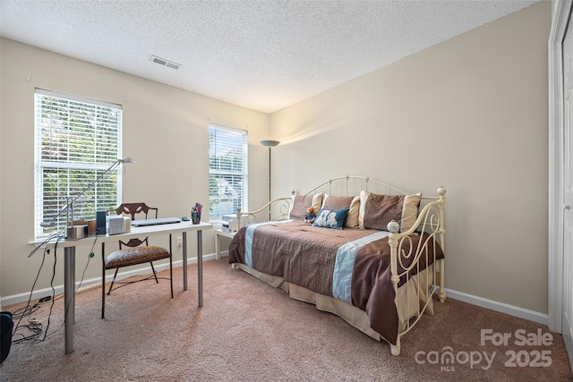 7029 Scuppernong Ct, Charlotte, NC 28215 - carpeted bedroom with a textured ceiling and an office area