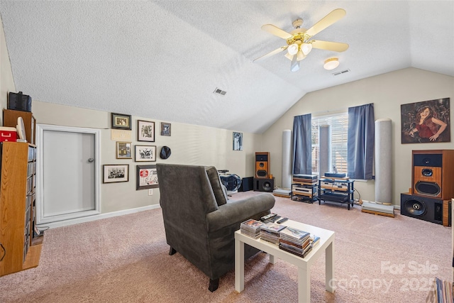 7029 Scuppernong Ct, Charlotte, NC 28215 - carpeted living room with a textured ceiling, vaulted ceiling, and a ceiling fan