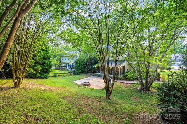 7029 Scuppernong Ct, Charlotte, NC 28215 - view of yard featuring a patio