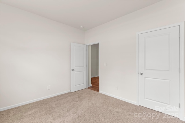 3505 Sycamore Crossing Ct, Mount Holly, NC 28120 - unfurnished bedroom with carpet and baseboards