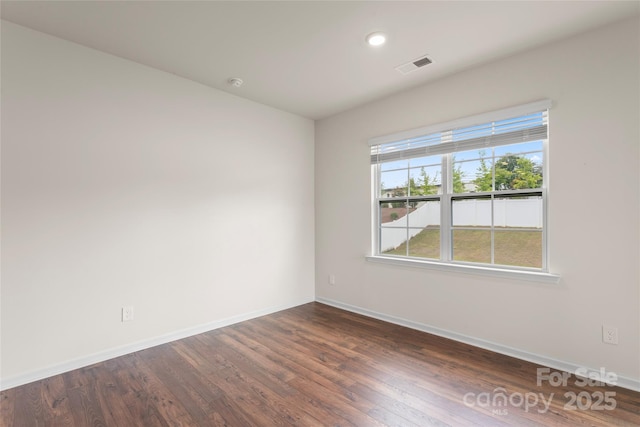 3505 Sycamore Crossing Ct, Mount Holly, NC 28120 - unfurnished room featuring dark wood-type flooring and recessed lighting