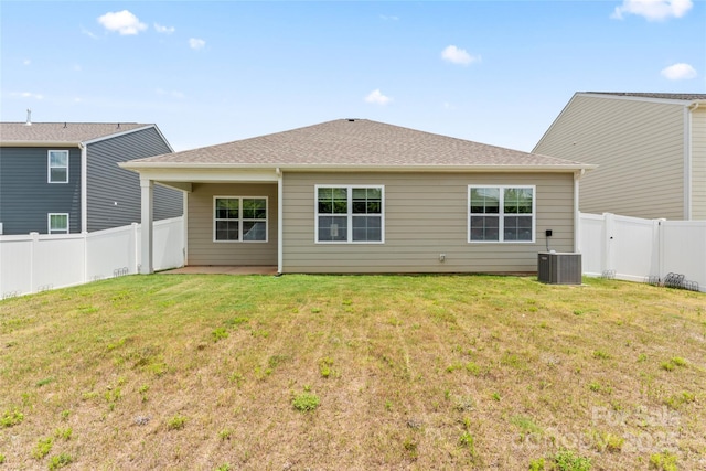 3505 Sycamore Crossing Ct, Mount Holly, NC 28120 - rear view of house featuring a fenced backyard and roof with shingles