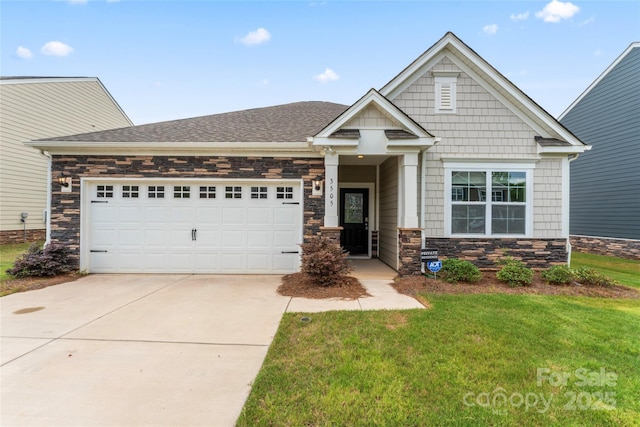 3505 Sycamore Crossing Ct, Mount Holly, NC 28120 - craftsman-style home with stone siding, driveway, a garage, a front yard, and roof with shingles
