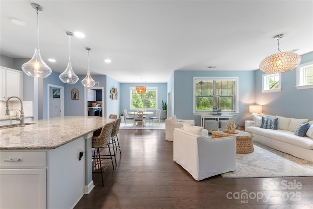 17514 Julees Walk Ln, Davidson, NC 28036 - living room with dark wood-type flooring and recessed lighting