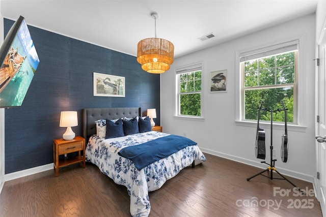 17514 Julees Walk Ln, Davidson, NC 28036 - bedroom featuring an accent wall and wood finished floors