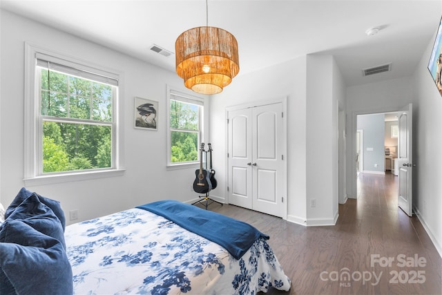 17514 Julees Walk Ln, Davidson, NC 28036 - bedroom featuring wood finished floors and a closet