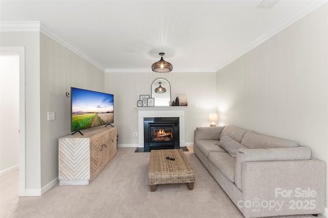17514 Julees Walk Ln, Davidson, NC 28036 - living room featuring ornamental molding, a fireplace with flush hearth, and light colored carpet