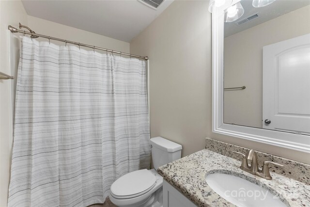 17514 Julees Walk Ln, Davidson, NC 28036 - bathroom with vanity and a shower with shower curtain