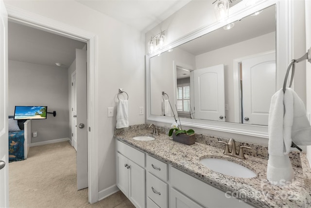 17514 Julees Walk Ln, Davidson, NC 28036 - full bath featuring double vanity and baseboards