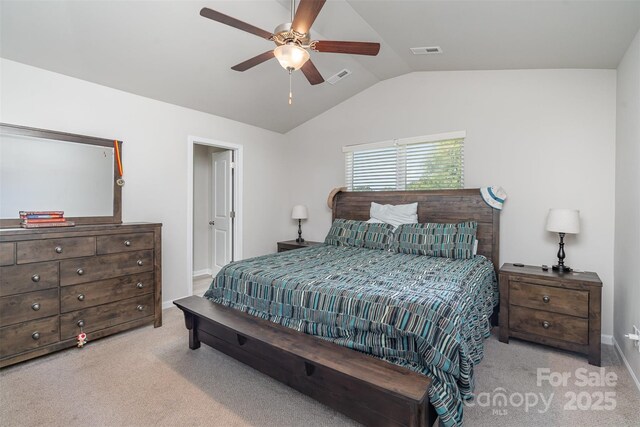 2014 Karen Woods Ln, Charlotte, NC 28216 - bedroom with vaulted ceiling, light colored carpet, and ceiling fan