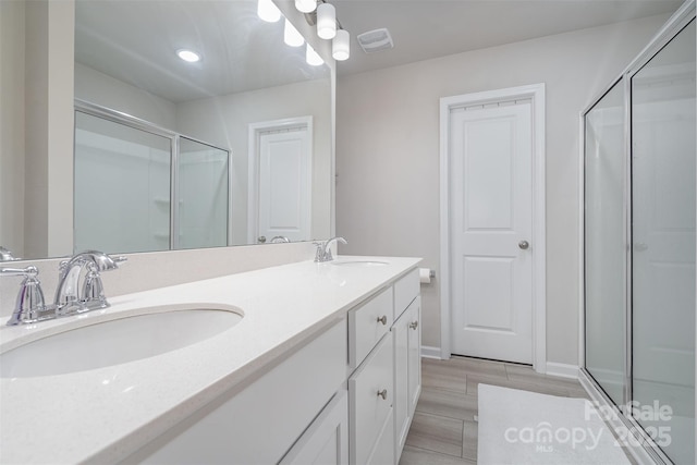 2014 Karen Woods Ln, Charlotte, NC 28216 - full bath featuring double vanity and a stall shower