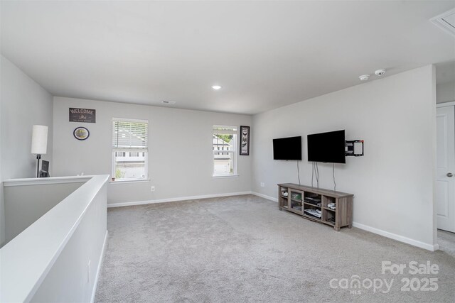 2014 Karen Woods Ln, Charlotte, NC 28216 - unfurnished living room featuring carpet floors and recessed lighting