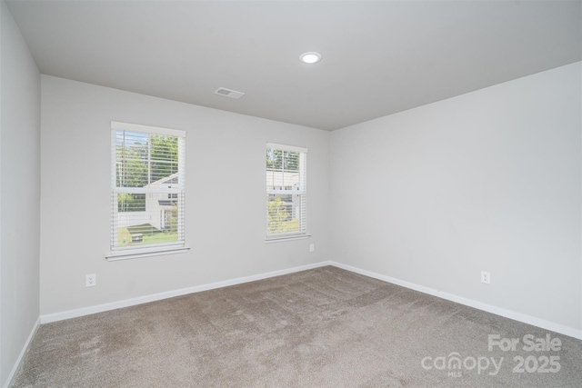 2014 Karen Woods Ln, Charlotte, NC 28216 - carpeted empty room featuring baseboards and recessed lighting