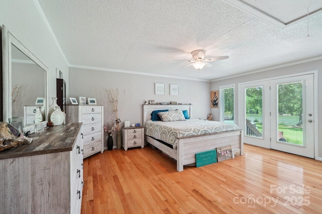 3770 Buck Point Rd, Catawba, NC 28609 - bedroom featuring access to exterior, light wood-style floors, a textured ceiling, ornamental molding, and ceiling fan