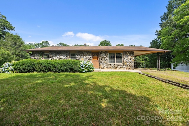 18 Progress Ln, Candler, NC 28715 - view of front facade with stone siding, an attached carport, and a front lawn